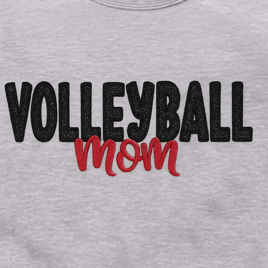 Gray sweatshirt with 'Volleyball Mom' text in black and red on a gray background