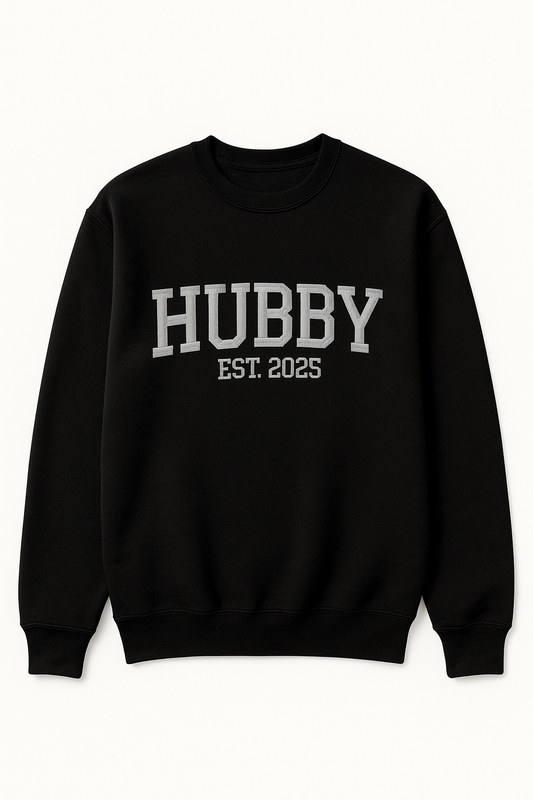 Black sweatshirt with 'HUBBY EST. 2023' text on a white background