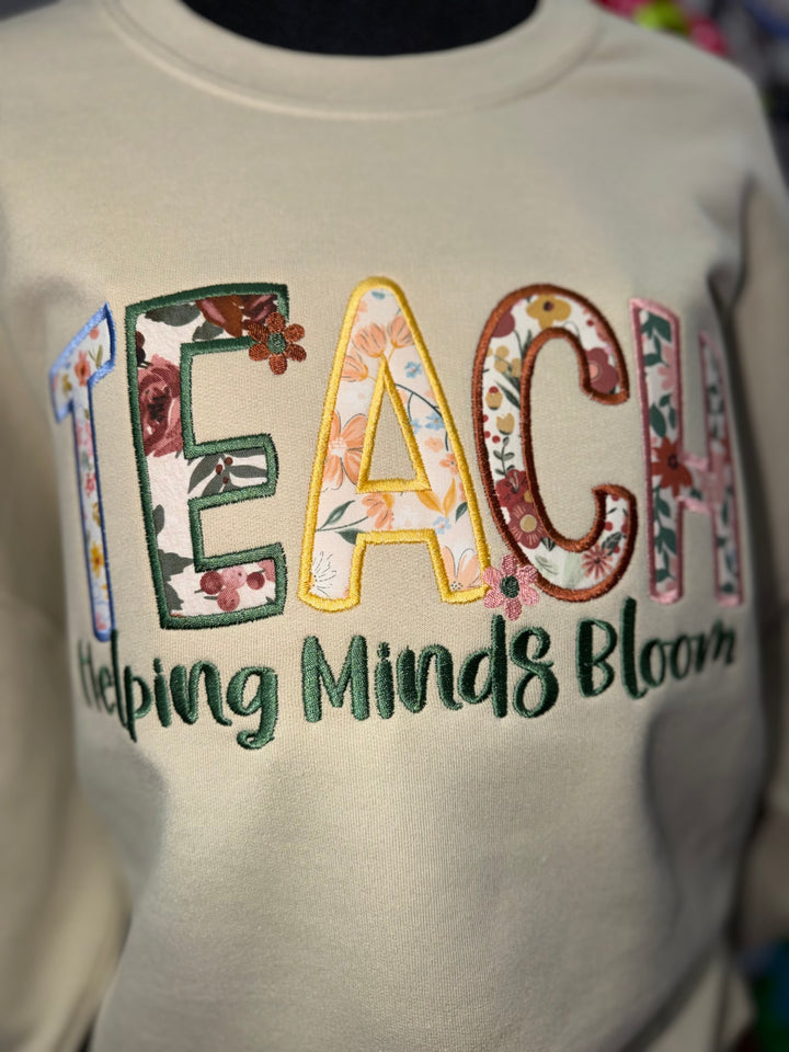 Helping Minds Bloom Embroidered Teacher Sweatshirt
