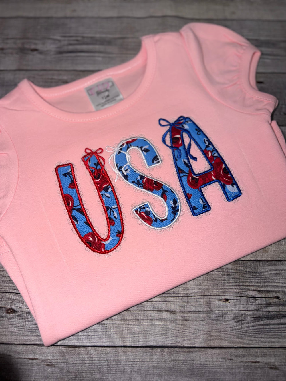 4th of july shirt for girls with embroidered usu applique design and boutique puff sleeve style