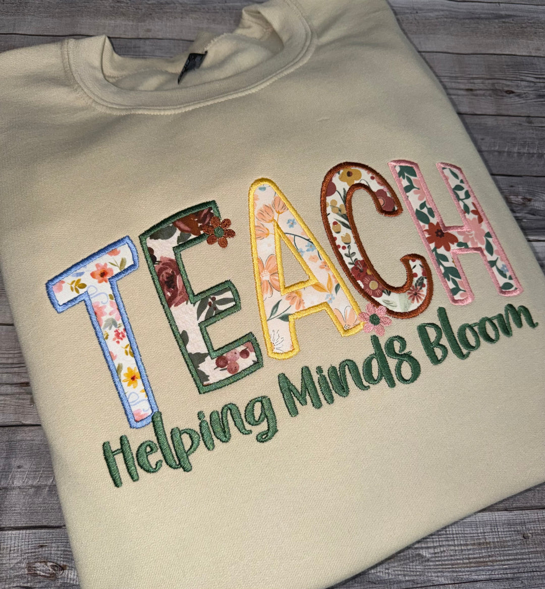 Helping Minds Bloom Embroidered Teacher Sweatshirt