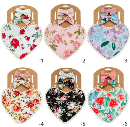 Two-sided floral printed, heart shaped bibs with matching bows