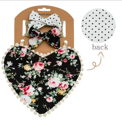 Two-sided floral printed, heart shaped bibs with matching bows