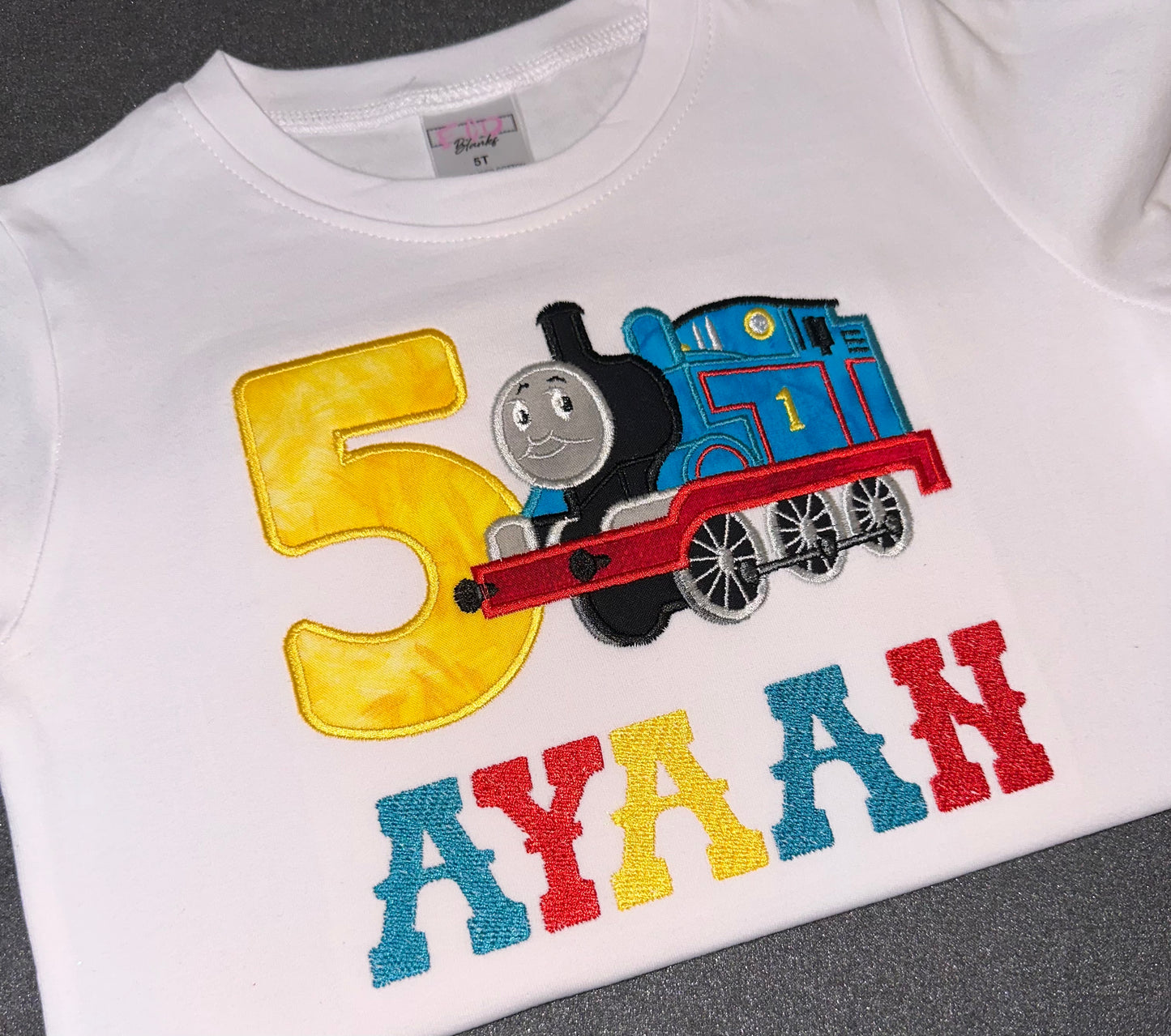 Thomas the train theme birthday shirt for boys. Embroidered on white crew neck