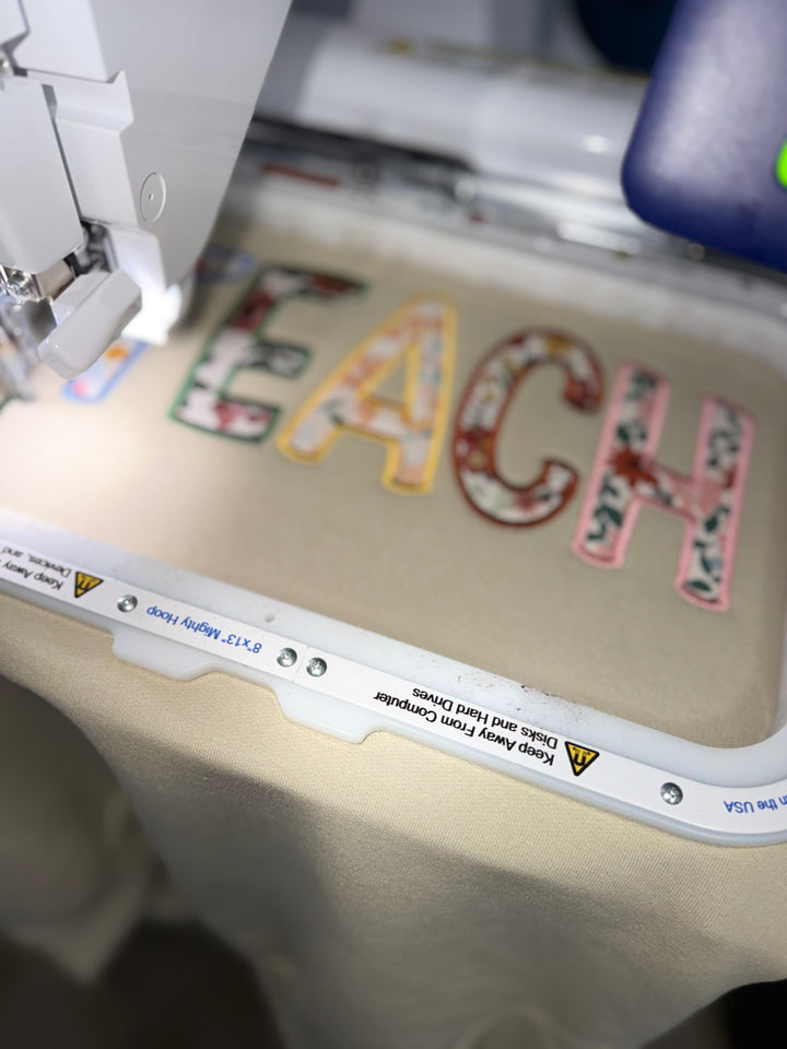 Helping Minds Bloom Embroidered Teacher Sweatshirt