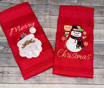 Merry Christmas towels featuring black Santa