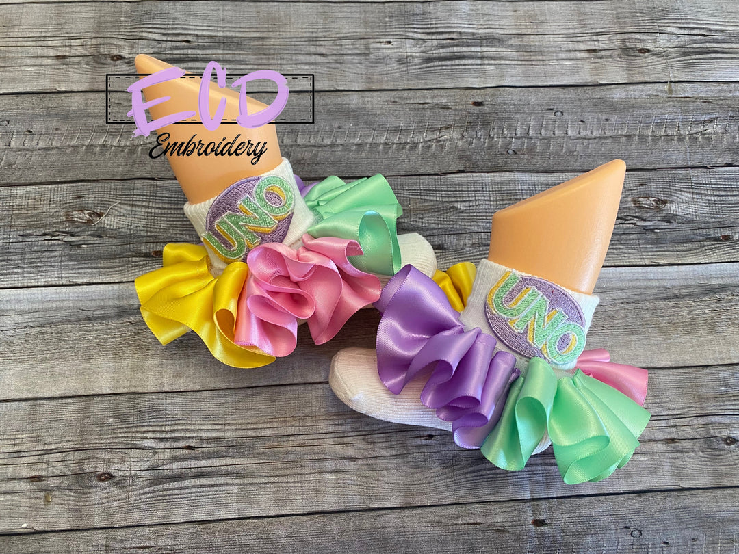 Uno theme birthday ideas. Uno theme birthday outfit. Uno theme ruffle socks/ankle skirts.