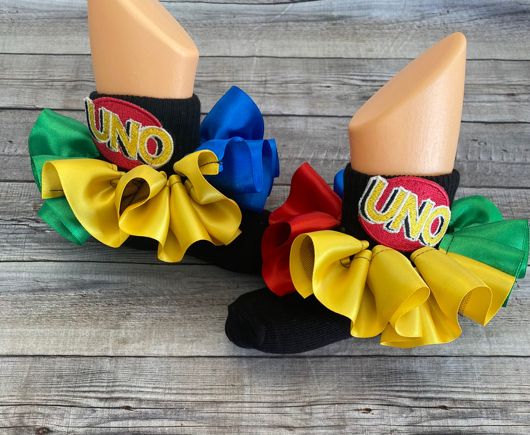 Uno theme birthday ideas. Uno theme birthday outfit. Uno theme ruffle socks/ankle skirts.