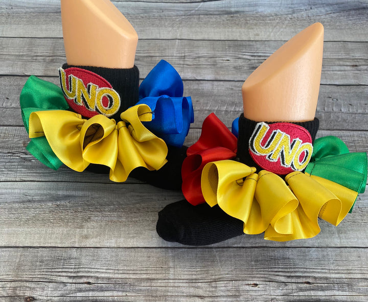 Uno theme birthday ideas. Uno theme birthday outfit. Uno theme ruffle socks/ankle skirts.
