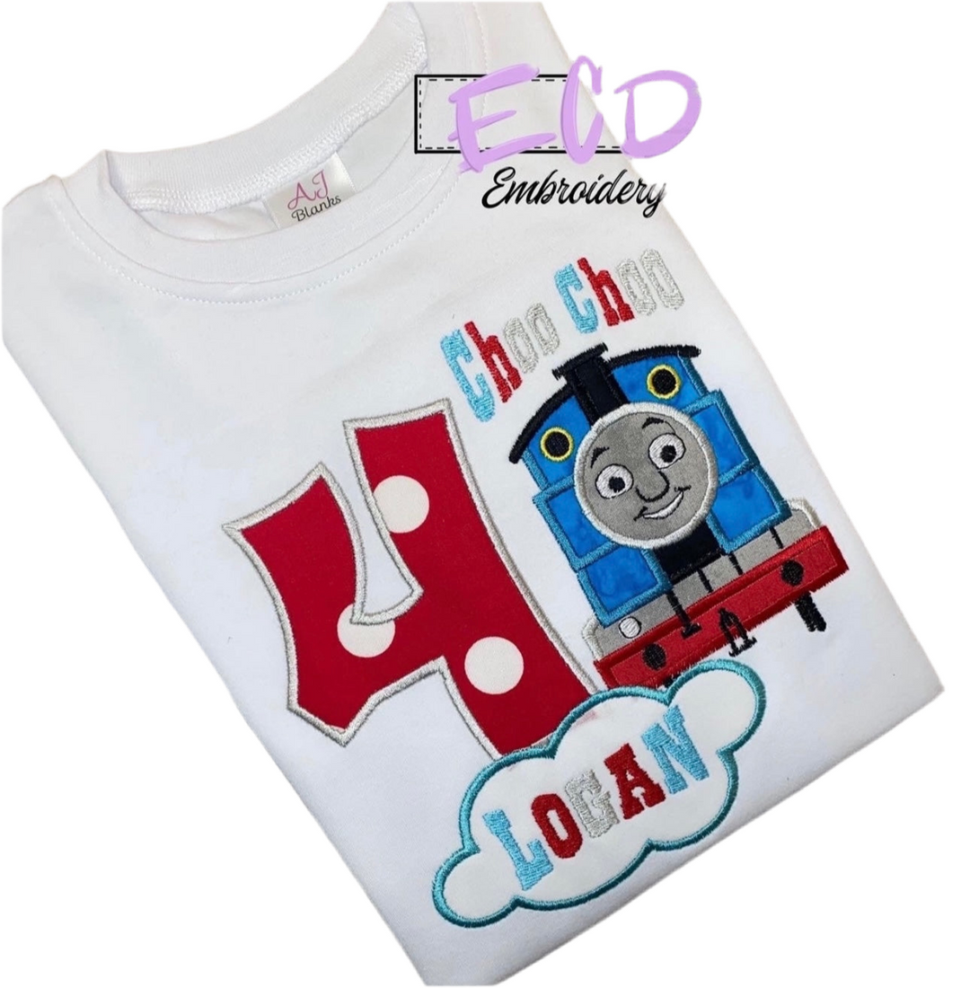 A personalized toy train theme birthday shirt with the number 4 and a cartoon train character on it, presented on a white background.