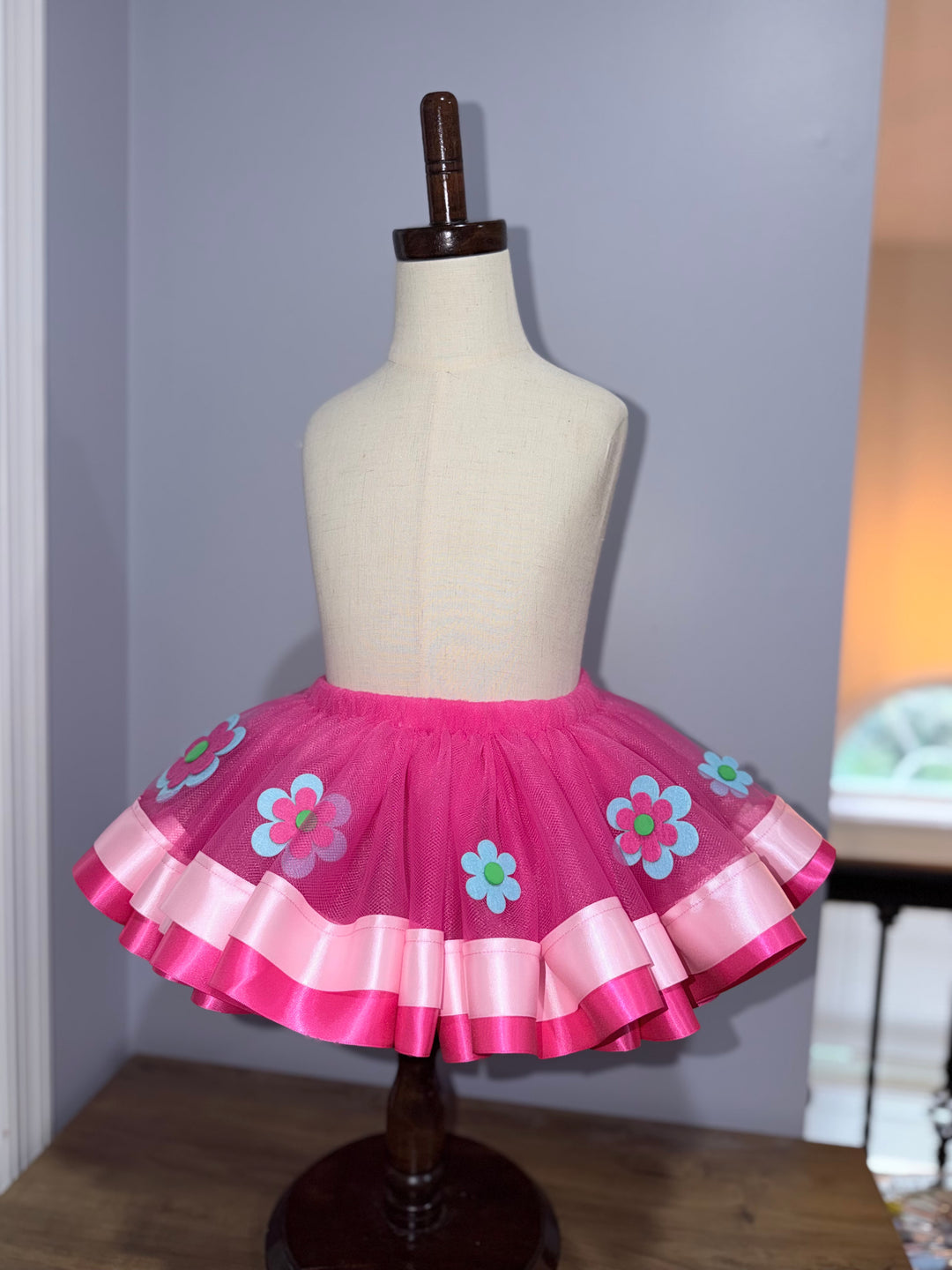 Trolls Poppy birthday tutu set with personalized white puff sleeve shirt, pink tutu, and flower appliques