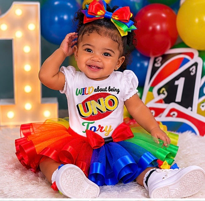     Wild About Being UNO personalized birthday outfit for a girl’s first birthday celebration