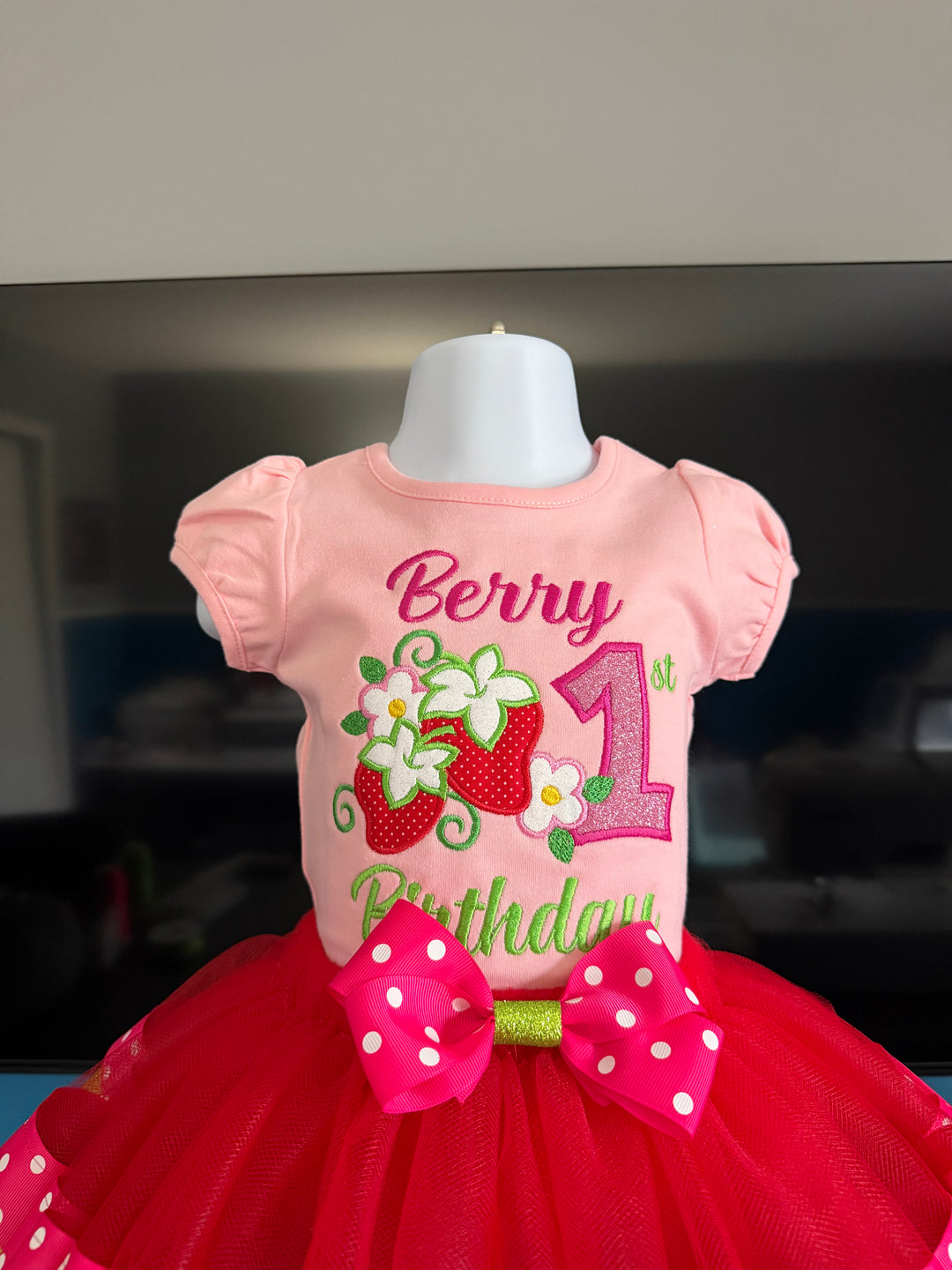 pink shirt with embroidered berry 1st birthday with red tulle shirt and pink and green ribbon trimmed