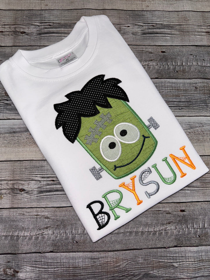 Kids Frankenstein Halloween shirt personalized with name and colorful embroidered monster